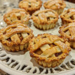 Mini Apple Pies taken with iphone 15 pro max --iw 2 --ar 4:5 --v 6.0 --raw